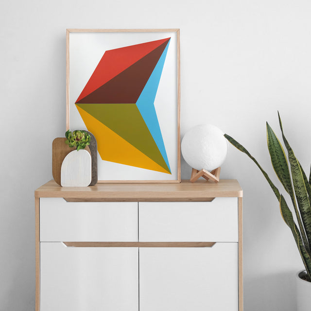 Aerial V – yellow and cream layered geometric screen print by Marcio Pontes, displayed on a wall