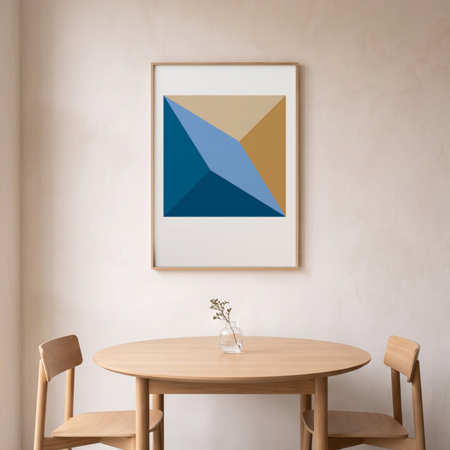 Cube Hidden 2 framed above a round oak dining table – art print by Marcio Pontes