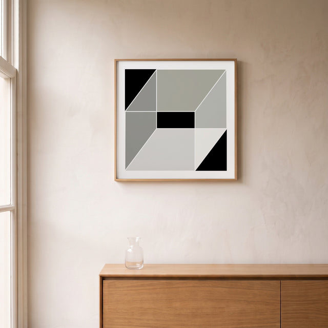 Cube Minimal Black framed above an oak sideboard by a canal-view window – art print by Marcio Pontes