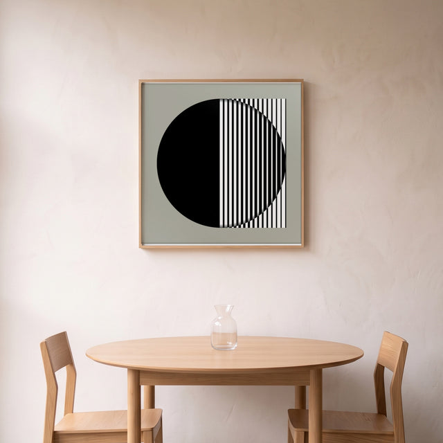 Geo Duo Lines framed above a round oak dining table – art print by Marcio Pontes