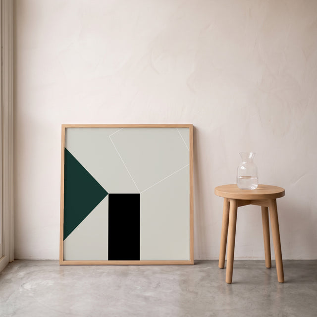 Fineline Balance I framed leaning against the wall on a concrete floor – art print by Marcio Pontes