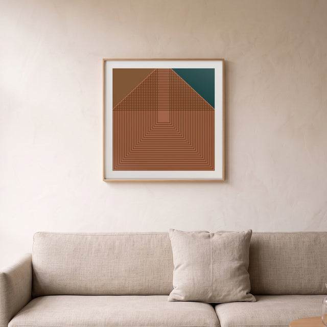Volpi B framed above a linen sofa – art print by Marcio Pontes